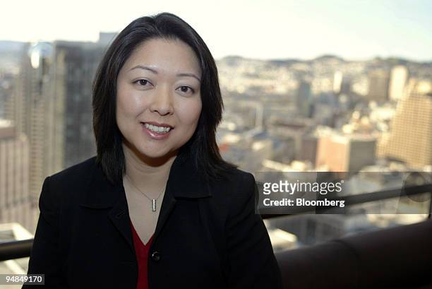 Vivienne Hsu, fund manager with Charles Schwab, poses in the downtown San Francisco, California office towers on Wednesday, February 15, 2006.