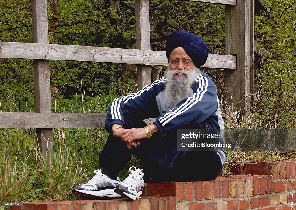 Fauja Singh rests after a run near his home in Ilford, Engla