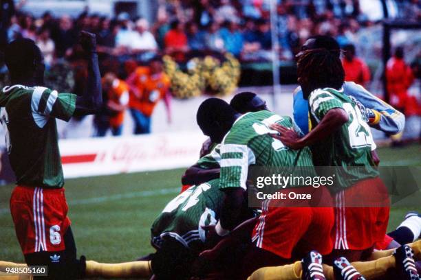 Team Cameroon celebrates during the opening match of the 1990 World Cup between Cameroon and Argentina at Stade Giuseppe Meazza, Milano, Italy on...
