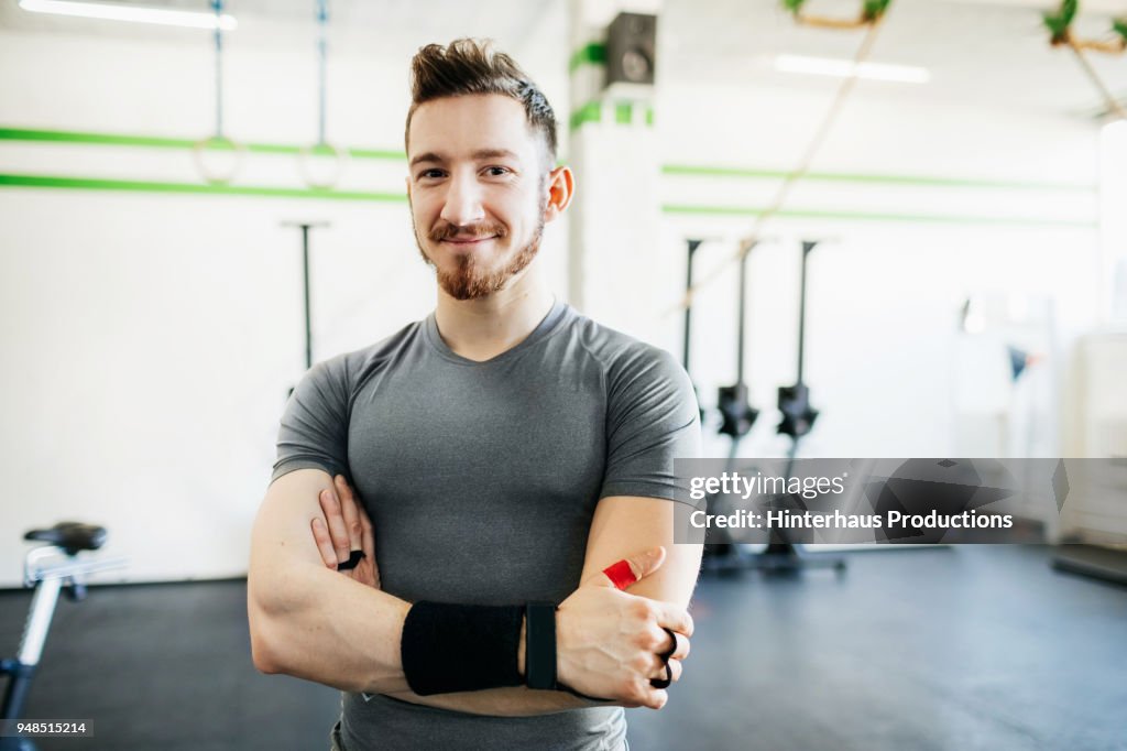 Portrait Of Fitness Trainer At Gym