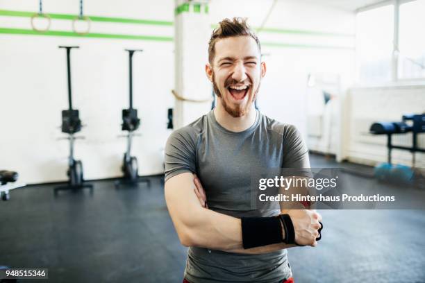portrait of fitness trainer laughing - sweat band stock pictures, royalty-free photos & images