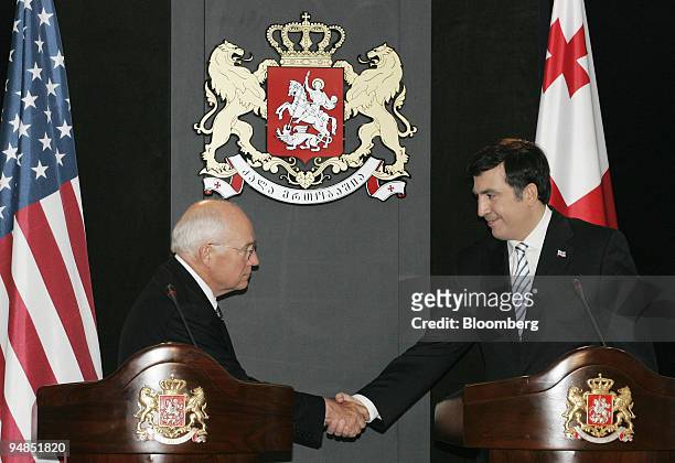 Vice President Dick Cheney, left, shakes hands with Georgian President Mikheil Saakashvili after a news conference in Tbilisi, Georgia, on Thursday,...