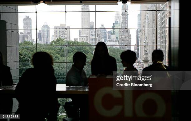 Patrons drink at Clo wine bar located in the Time Warner Center in New York, U.S., on Friday, Aug. 29, 2008. A few sips of Vega Sicilia Cosecha will...