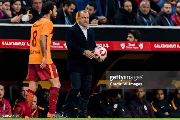 Selçuk Inan of Galatasaray SK, coach Fatih Terim of Galatasaray SK during the Ziraat Turkish Cup match Fenerbahce AS and Akhisar Belediyespor at the...