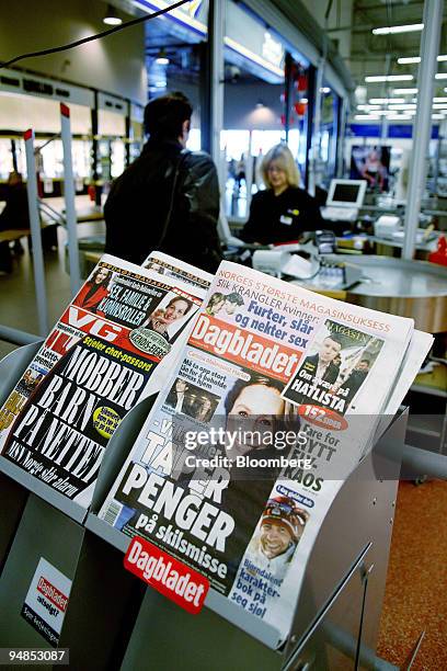 Norwegian newspapers are seen on sale at the Toeckfors Shopping Mall on Saturday, February 11, 2006 in Toeckfors, Sweden. Olav Thon has become a...