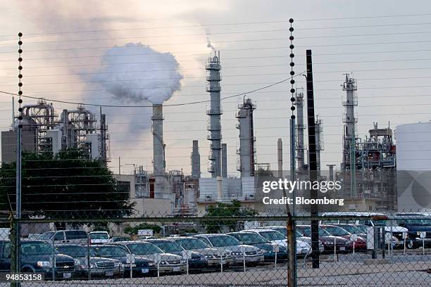 An Exxon Mobil Corp. Refinery stays in operation in Baton Rouge, Louisiana, on Sunday, Aug. 31, 2008. At least eight refineries are shutting, taking...