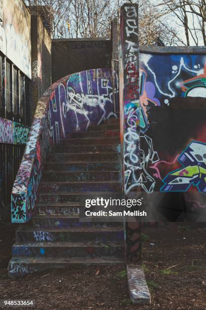 Concrete steps covered in colourful graffiti at Trellick Tower on the 26th March 2018 in West London, United Kingdom. Trellick Tower is Grade II...