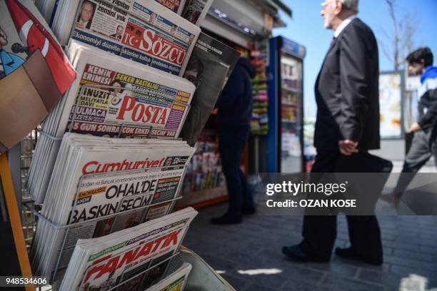 Photo taken on April 19, 2018 shows the front page of Turkey's opposition daily newspaper Cumhuriyet reading "Raid election in the state of...