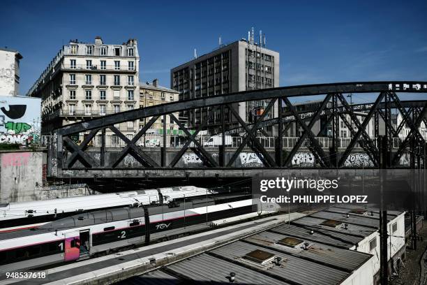 Trains stand at plaforms of the Gare de l'Est railway station on April 19, 2018 in Paris, on the second day and of a two-day stoppage on the French...