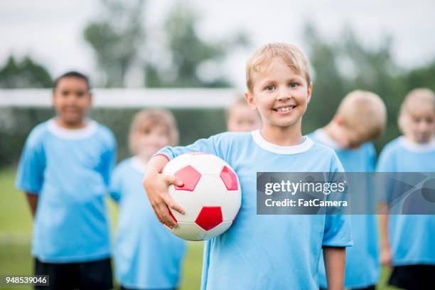 young boys soccer team portrait - fat soccer players stock pictures, royalty-free photos & images