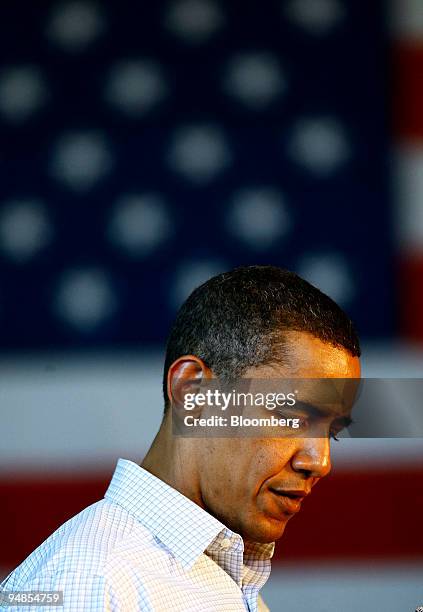 Barack Obama, a U.S. Senator and 2008 Democratic presidential candidate, pauses while speaking to supporters during a campaign event in Roseburg,...