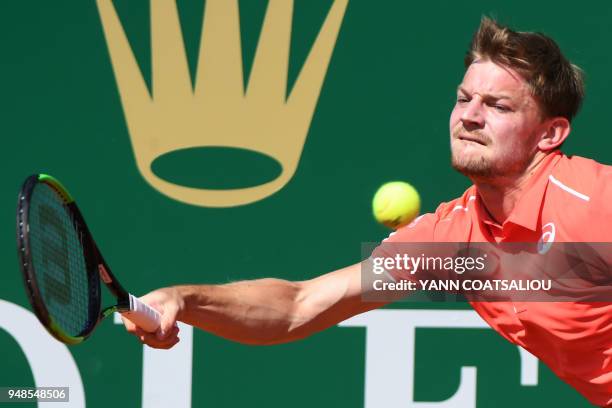 Belgium's David Goffin returns the ball to Spain's Roberto Bautista Agut during their tennis match as part of the Monte-Carlo ATP Masters Series...