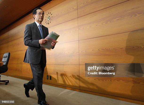 Masaaki Shirakawa, governor of the Bank of Japan, leaves a news conference in Tokyo, Japan, on Friday, Oct. 31, 2008. The Bank of Japan cut its...