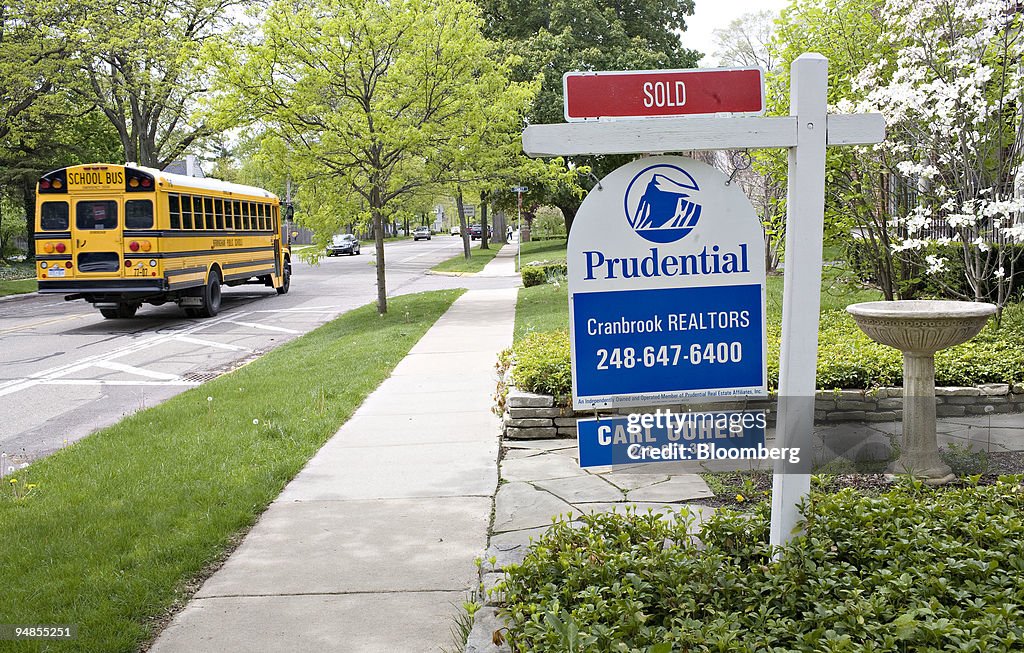 A sold sign stands in front of a home in Birmingham, Michiga