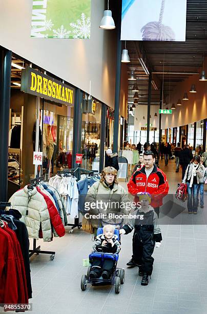 Customers shop at the Toeckfors Shopping Mall on Saturday, February 11, 2006 in Toeckfors, Sweden. Olav Thon has become a billionaire as his 14...