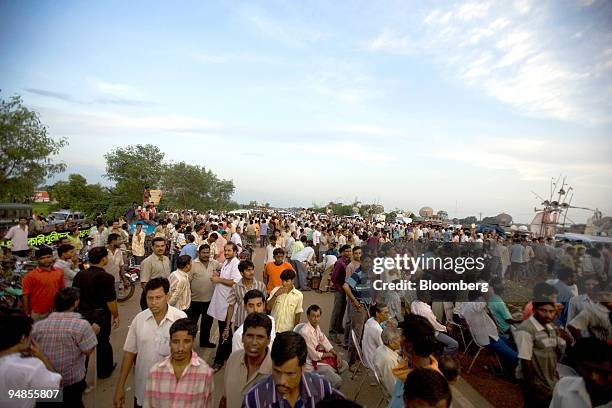 People gather to protest in front of the unfinished Tata Nano plant in Singur, India, on Tuesday, Aug. 26, 2008. West Bengal Chief Minister Buddhadeb...