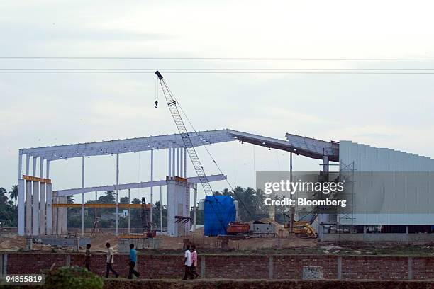 Part of the unfinished Tata Nano plant is seen in Singur, India, on Tuesday, Aug. 26, 2008. West Bengal Chief Minister Buddhadeb Bhattacharjee said...
