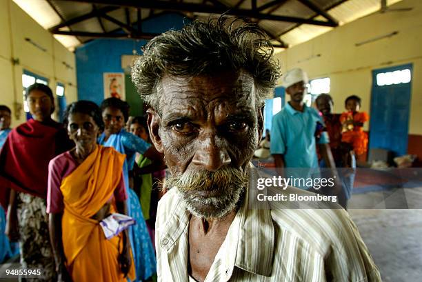 Tired and angry villager questions an official at a refugee camp in Car Nicobar islands Wednesday December 29, 2004 after a tsunami hit the southern...