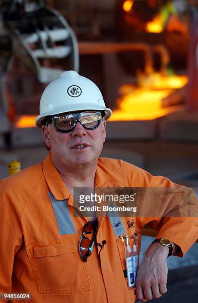 Resources Ltd. Chief executive Andrew Michelmore speaks to reporters in front of a copper smelter at WMC Recourses Ltd.'s Olympic Dam copper mine in...