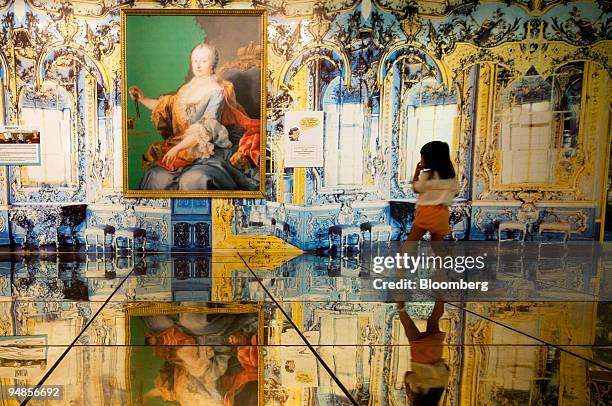 Child tours the exhibition, "Mozart: A Child Prodigy," at the National Museum of Singapore in Singapore, on Thursday, May 8, 2008. "Mozart: A Child...