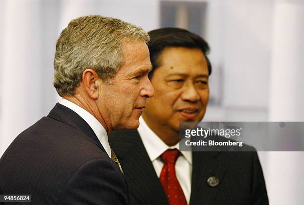 President George W. Bush, left, and Indonesia's President Susilo Bambang Yudhoyono, are pictured after the reading of the final declaration of the...