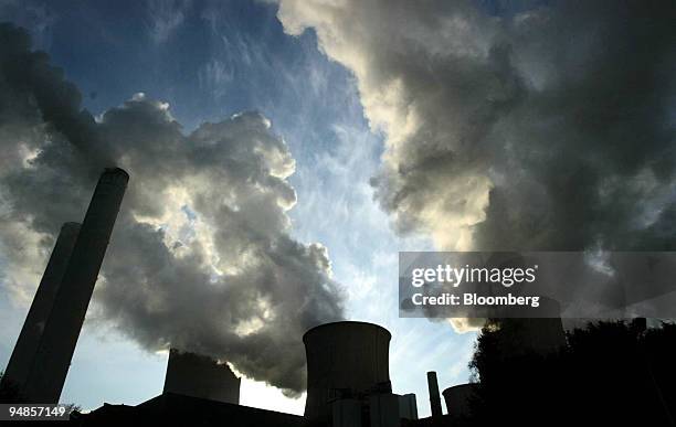 Smoke stacks seen at an RWE coal power station near Cologne, Germany, Wednesday, March 31, 2004. The seven-year-old Kyoto Protocol comes into force...