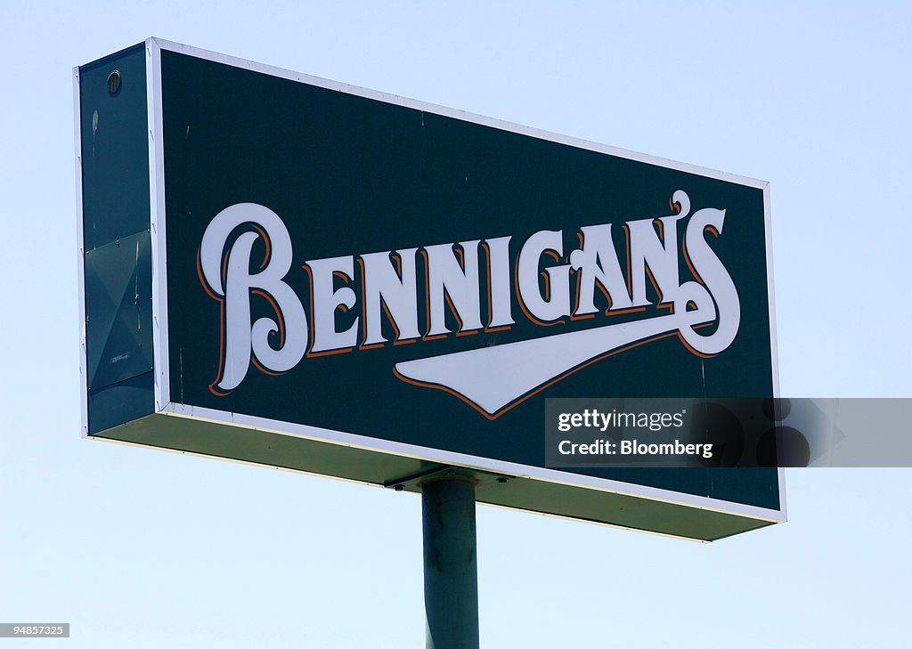 A Bennigan's restaurant sign sits outside the restaurant in