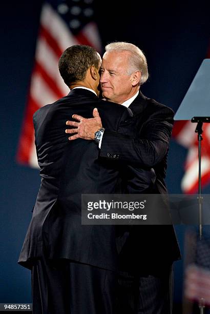 Democratic president-elect Barack Obama, left, embraces vice president-elect Joe Biden after delivering his acceptance speech during an election...