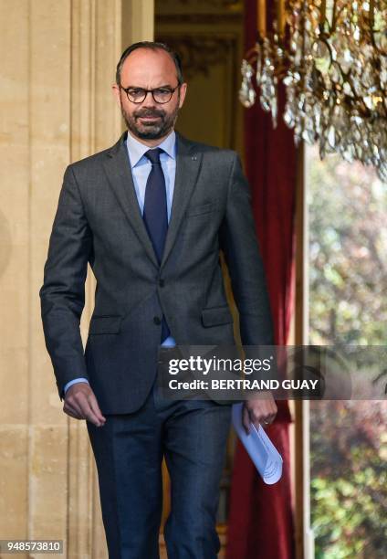 French Prime Minister Edouard Philippe leaves after a meeting gathering members of the government and local elected representatives of the French...