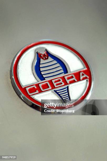 The Shelby Cobra logo is displayed on the hood of a vehicle at the Shelby Automotive show room in Las Vegas, Nevada, U.S., on Wednesday, April 2,...