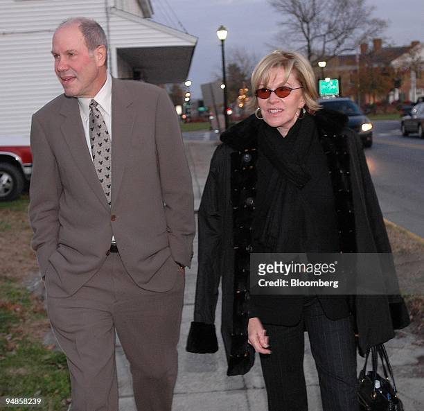 Walt Disney Co. Chief executive Michael D. Eisner and Zenia Mucha, Head of Disney Corporate Communications, exit the courthouse at the end of the day...
