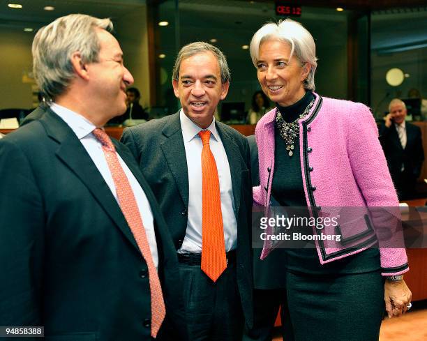 Yeoryios Alogoskoufis, Greece's finance minister, left, Charilaos Stavrakis, Cyprus's finance minister, center, and Christine Lagarde, France's...