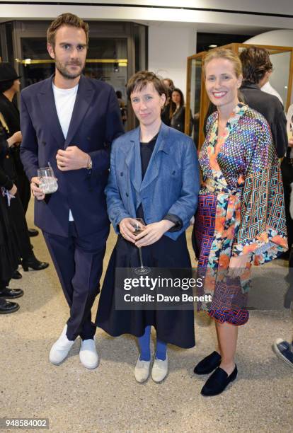 Oscar Valentine, Frances von Hofmannsthal and Sophie Oakley attend the Gucci Elton John Capsule launch hosted by Dover Street Market & Gucci at Dover...