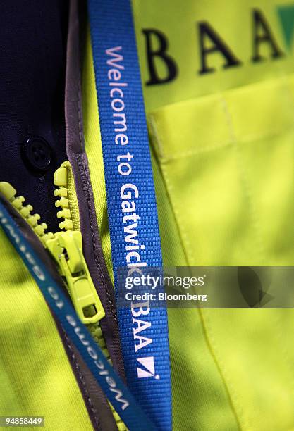 Member of the BAA security staff wears his lanyard at Gatwick airport in Crawley, Sussex, U.K., on Wednesday, Aug. 20, 2008. Global Infrastructure...