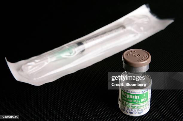 Partially used bottle of Heparin and a syringe are arranged for a photograph in Toledo, Ohio, U.S., on Friday, April 4, 2008. U.S. And Chinese...