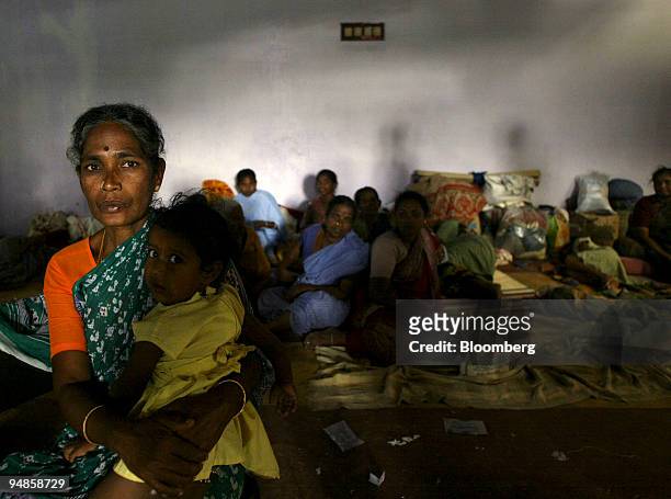 Group of women wait for food in a relief camp in Cuddalore, Tami Nadu, India on Friday, December 31, 2004. As the death toll from the December 26...