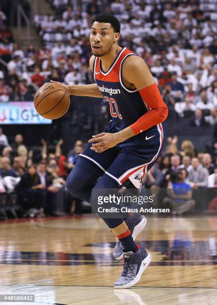 Otto Porter Jr. #22 of the Washington Wizards brings the ball up court against the Toronto Raptors in Game Two of the Eastern Conference First Round...