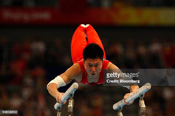 Li Xiaopeng of China, competes in the men's parallel bars final event on day 11 of the 2008 Beijing Olympics in Beijing, China, on Tuesday, Aug. 19,...