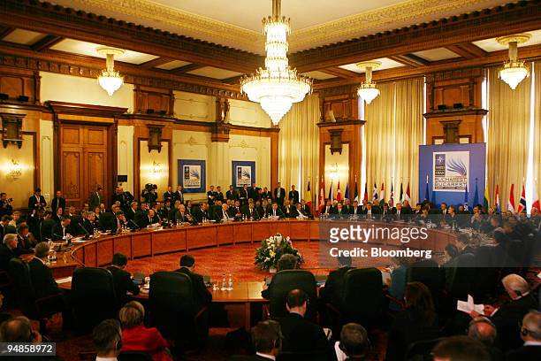 Heads of state gather for a meeting on Ukraine during the NATO summit in Bucharest, Romania, on Friday, April 4, 2008. Russian President Vladimir...