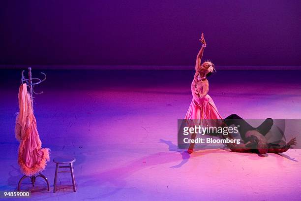 Dancers with Alvin Ailey American Dance Theater perform an excerpt from the 1958 ballet "Blues Suite" during the theater's 50th anniversary...
