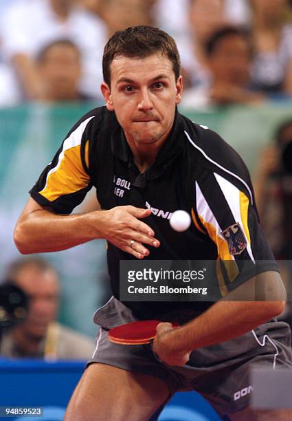 Timo Boll of Germany, returns the ball to Ma Lin of China, during the gold medal match of the men's team table tennis event on day 10 of the 2008...