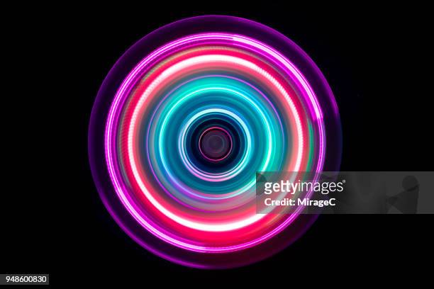 colorful light trail swirl - focus concept stock-fotos und bilder