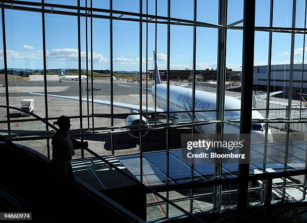 An Air New Zealand airplane is parked at Auckland International Airport, in Auckland, New Zealand, on Thursday, April 10, 2008. Air New Zealand Ltd.,...