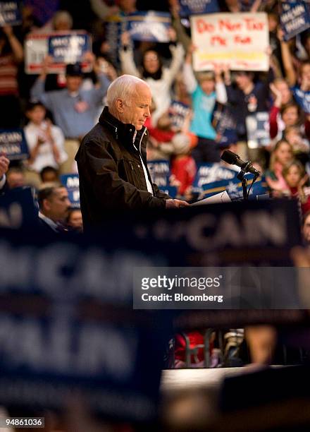 Senator John McCain of Arizona, Republican presidential candidate, pauses while speaking during a campaign rally at the Strath Haven High School in...