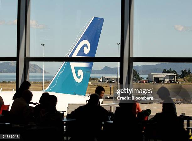 An Air New Zealand airplane is parked at Auckland International Airport, in Auckland, New Zealand, on Thursday, April 10, 2008. Air New Zealand Ltd.,...