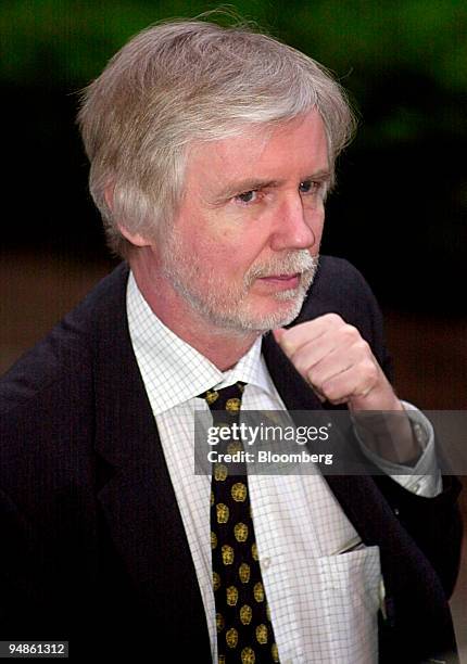 Finnish Foreign Minister Erkki Tuomioja arrives for the start of the European Council meeting in Brussels, Belgium on Thursday, March 25, 2004.