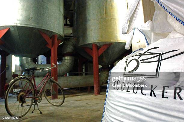 Large bag of sugar to be sent to large-volume customers sits next to a parked bicycle at the Suedzucker factory in Gross-Gerau, near Mannheim,...
