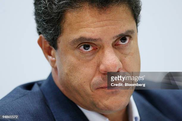 Roger Agnelli, president and chief executive officer with Cia. Vale do Rio Doce, listens to a question during a news conference at the Alunorte...