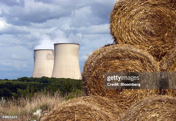 The cooling towers of the Electricite de France, or EDF, Cattenom nuclear power plant operate near Cattenom, France, on Thursday, Aug. 14, 2008. The...