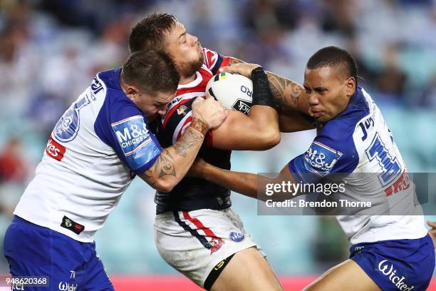 Jared Waerea-Hargreaves of the Roosters is tackled by the Bulldogs defence during the round seven NRL match between the Canterbury Bulldogs and the...